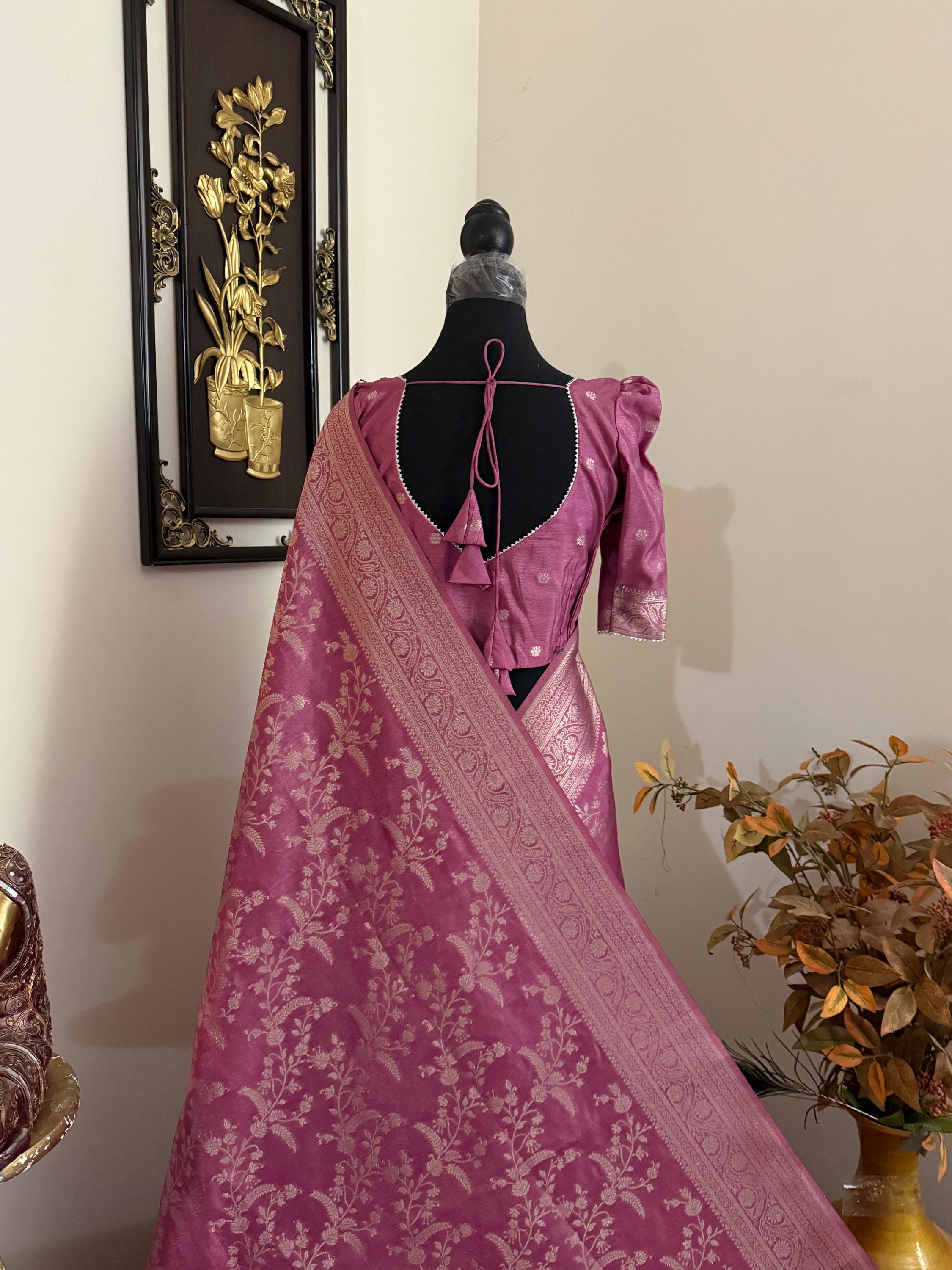 Beautiful banarasi saree with silver Zari weaving all over the saree paired up with pretty ready to wear  blouse that fits to 32 to 46