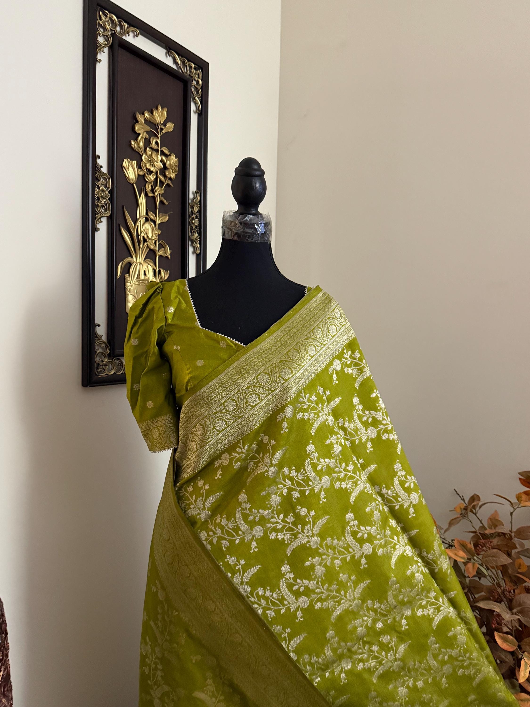Beautiful banarasi saree with silver Zari weaving all over the saree paired up with pretty ready to wear  blouse that fits to 32 to 46