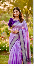 Beautiful banarasi saree paired up with pretty maggam work blouse.