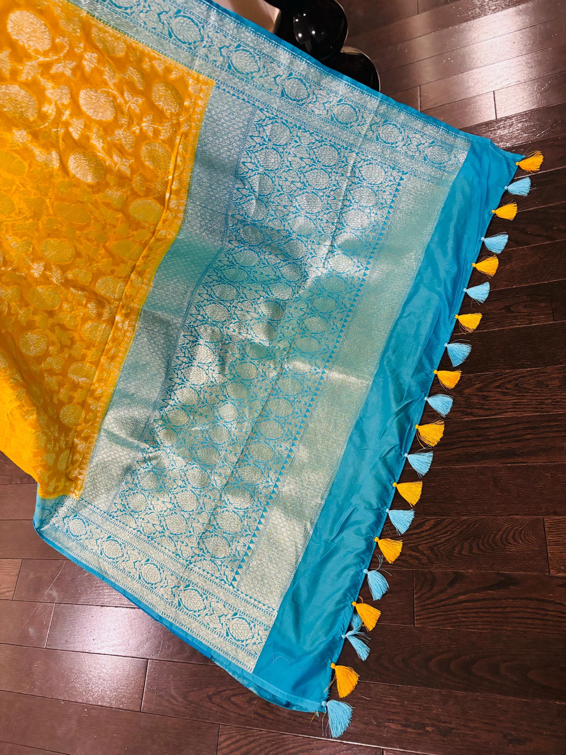 Beautiful banarasi silk saree paired up with beautiful embroidery blouse fits to 32 to 46 in beautiful rare colors all over jaal. Cocktails