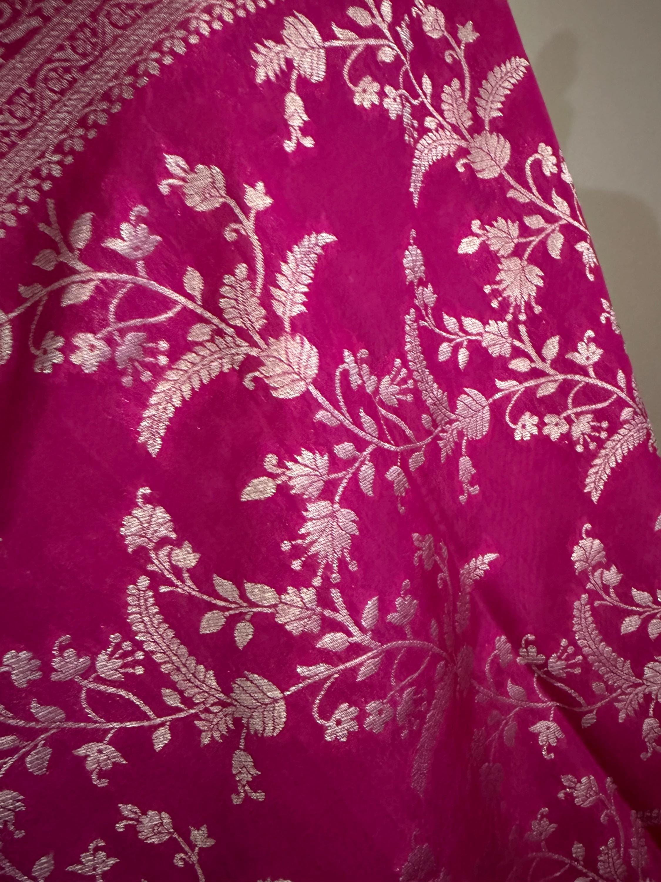 Beautiful banarasi saree with silver Zari weaving all over the saree paired up with pretty ready to wear  blouse that fits to 32 to 46