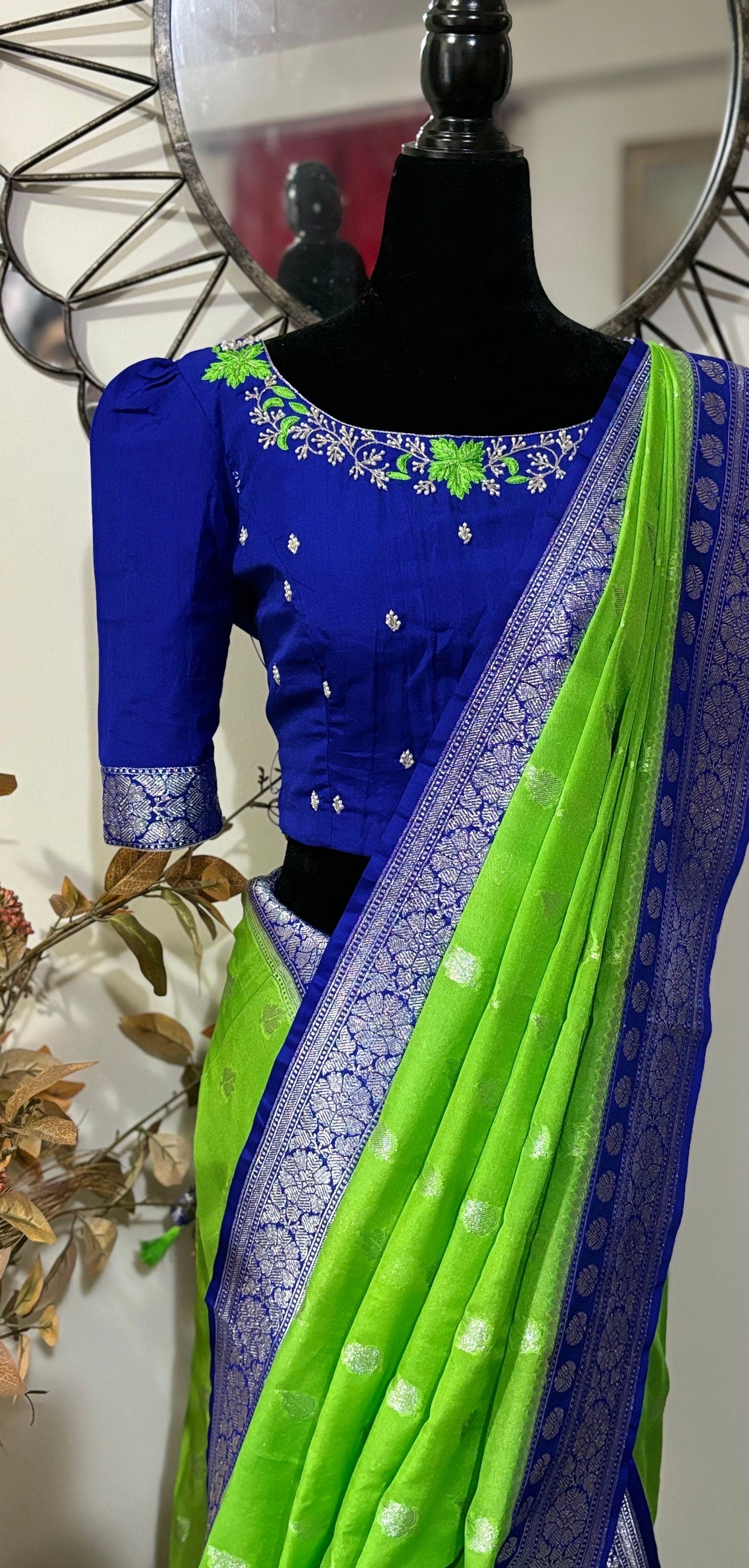 Beautiful banarasi kattan saree paired up with pretty maggam work blouse.