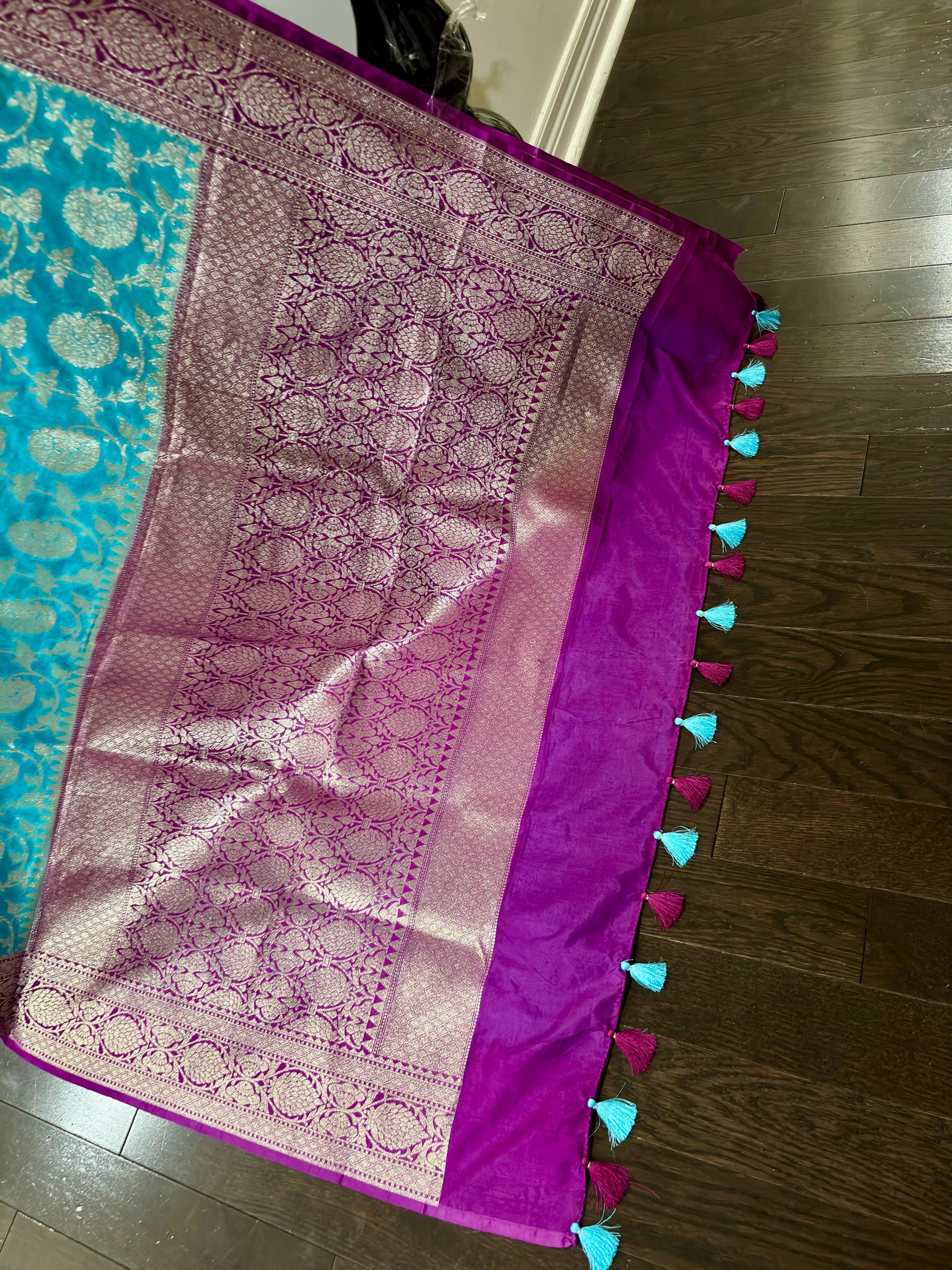 Beautiful banarasi silk saree paired up with beautiful embroidery blouse fits to 32 to 46 in beautiful rare colors all over jaal. Cocktails