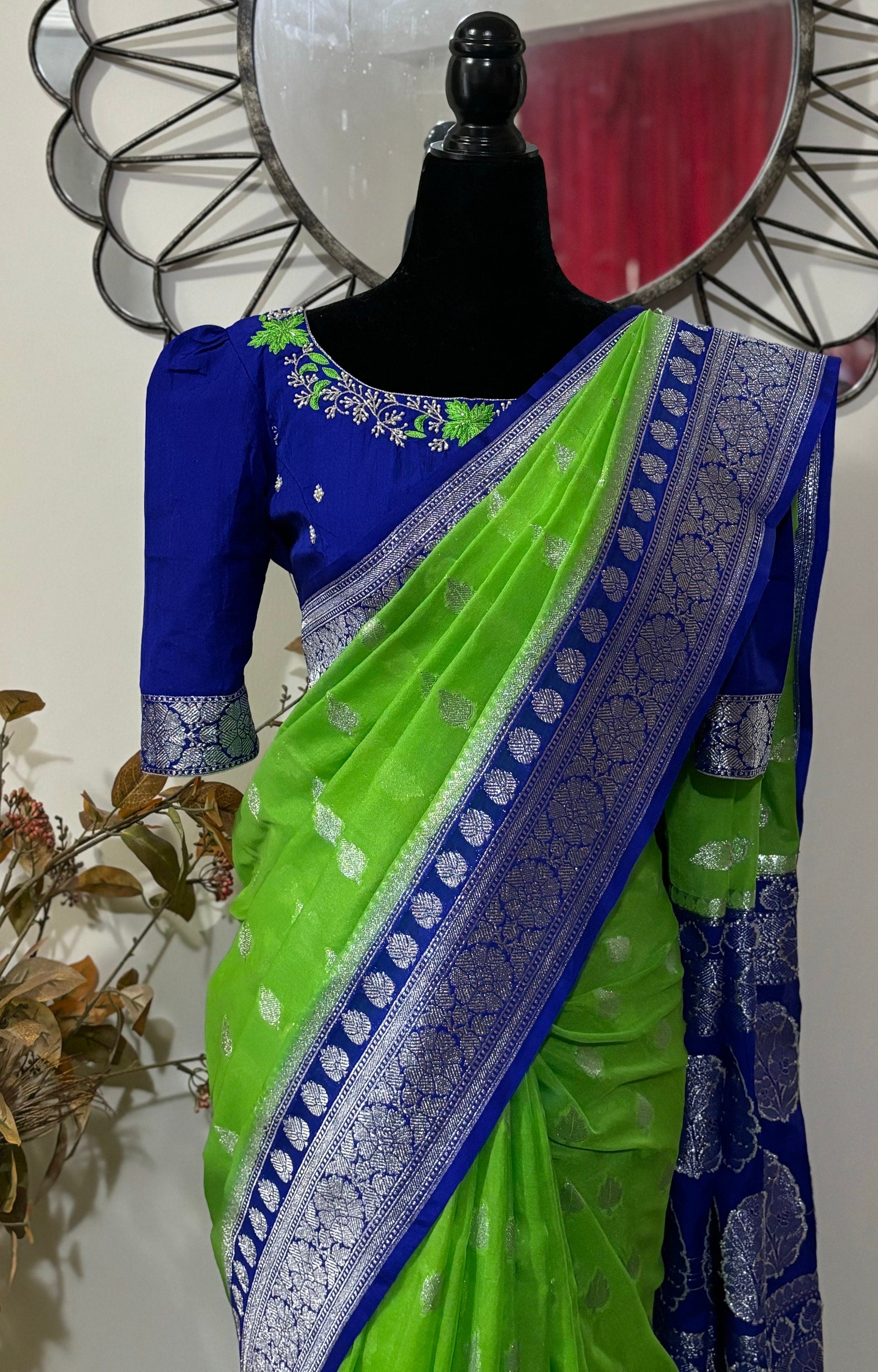Beautiful banarasi kattan saree paired up with pretty maggam work blouse.