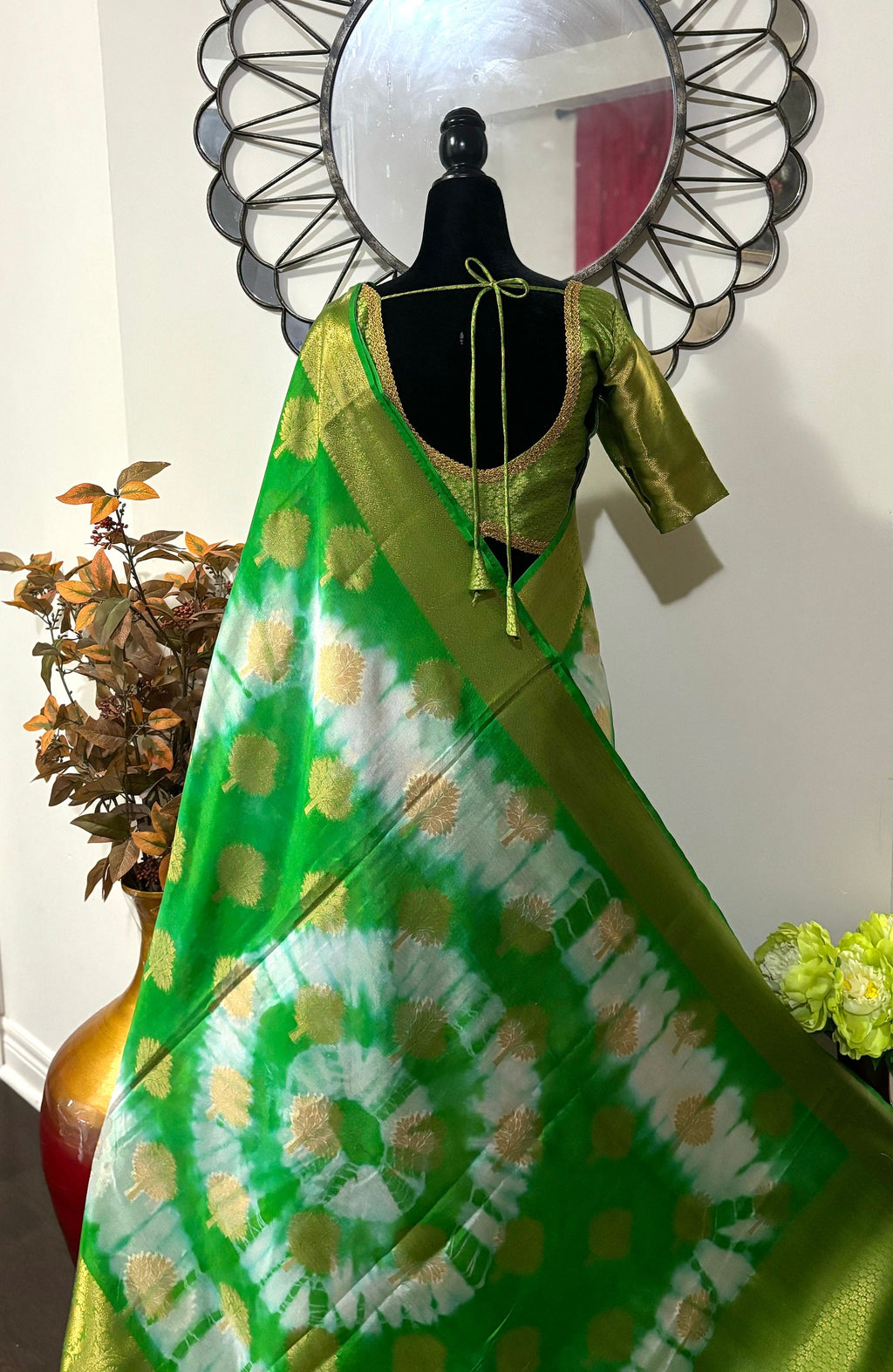 Banarasi kora organza saree with beautiful tie and dye all over the saree. Saree is ready with beautiful designer blouse that fit to 32-46