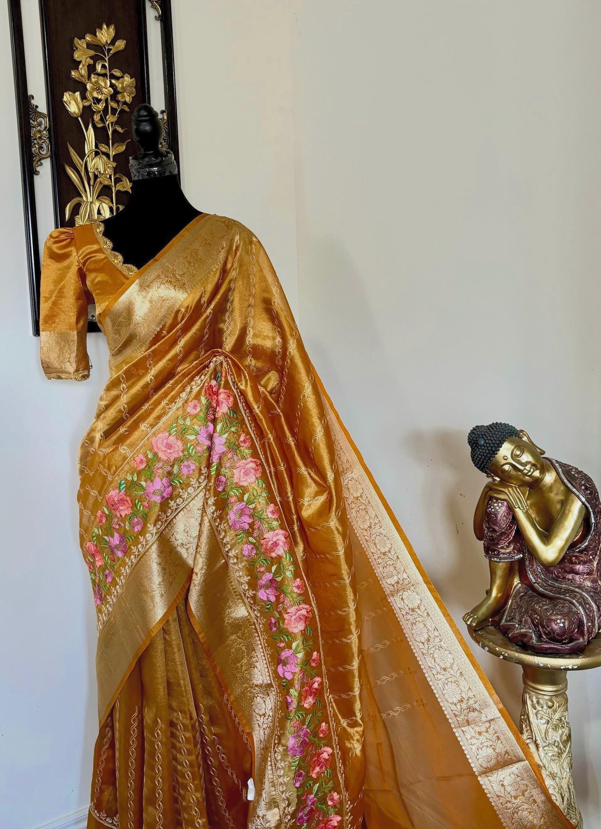 Banarasi  tissue saree with self weaving with beautifully embroidered boarder all over the saree in Golden shade rich weaving ready Blouse