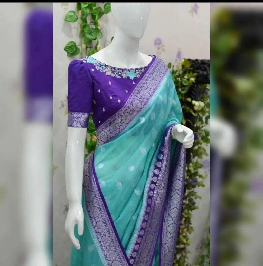 Beautiful banarasi saree paired up with pretty maggam work blouse.
