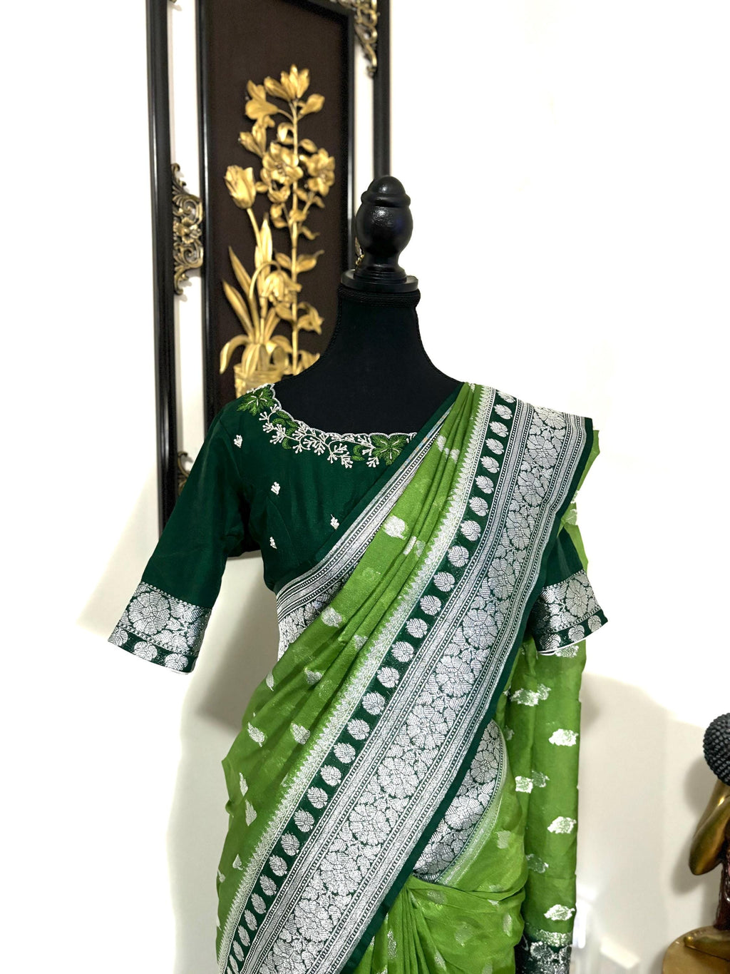 Beautiful banarasi saree paired up with pretty maggam work blouse.dits to 32-46