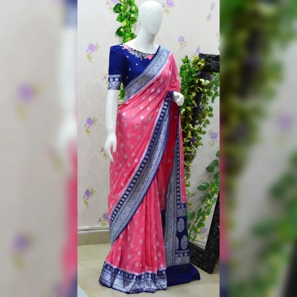 Beautiful banarasi kattan saree paired up with pretty maggam work blouse.
