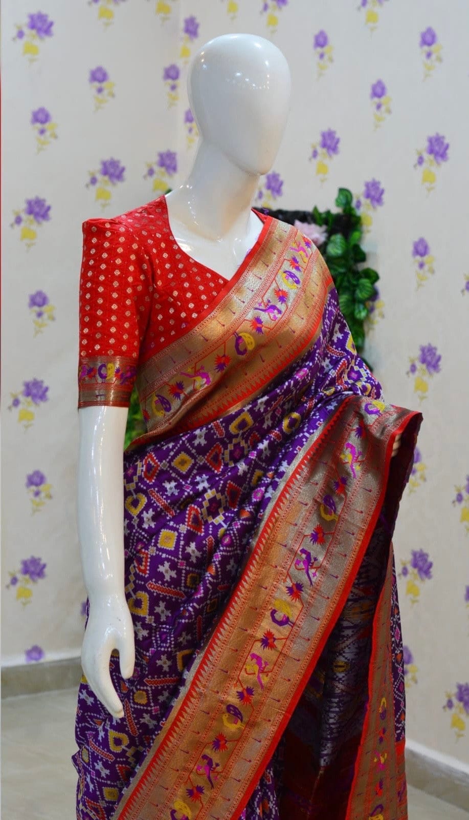 Beautiful patola paithani saree paired up with pretty banaras weaving blouse