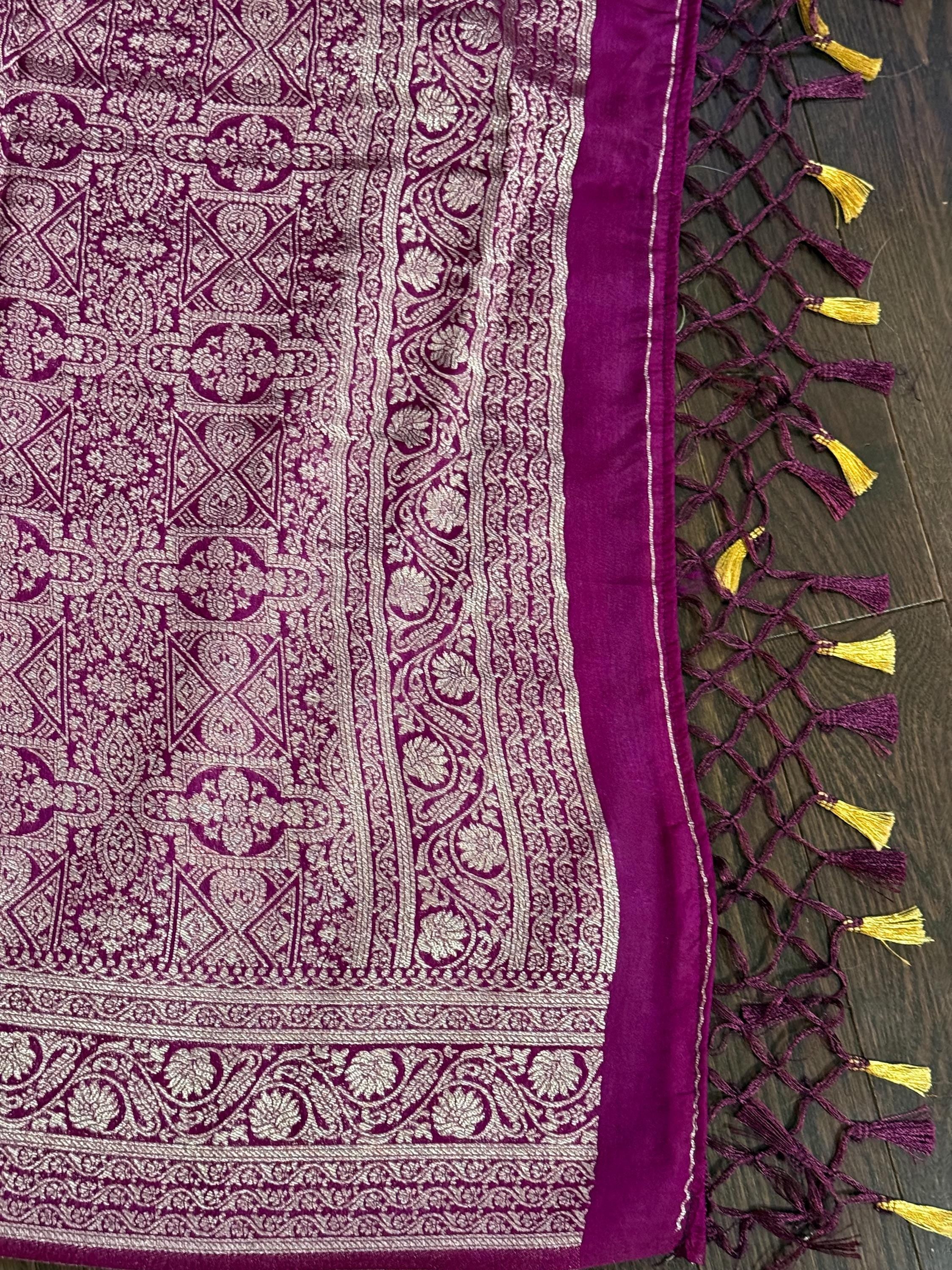 Beautiful banarasi saree with silver Zari weaving all over the saree paired up with pretty ready to wear  blouse that fits to 32 to 46