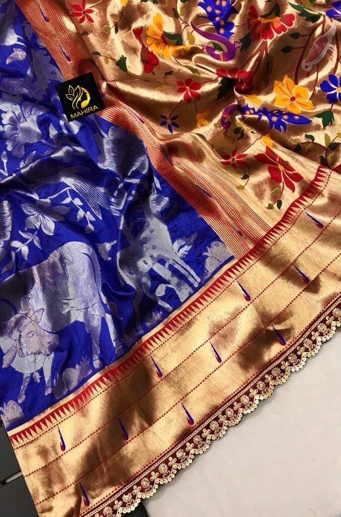Beautiful soft paithani silk saree with all over zari weaving along with contrast munia border and pretty sequins lace border