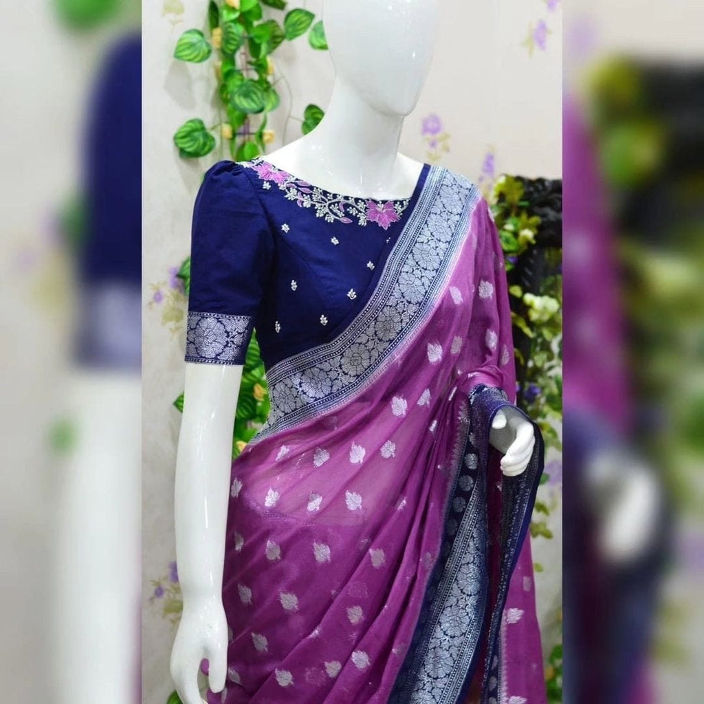 Beautiful banarasi saree paired up with pretty maggam work blouse.