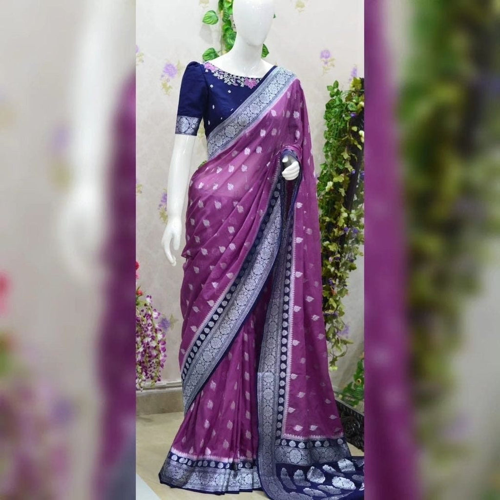Beautiful banarasi kattan saree paired up with pretty maggam work blouse.