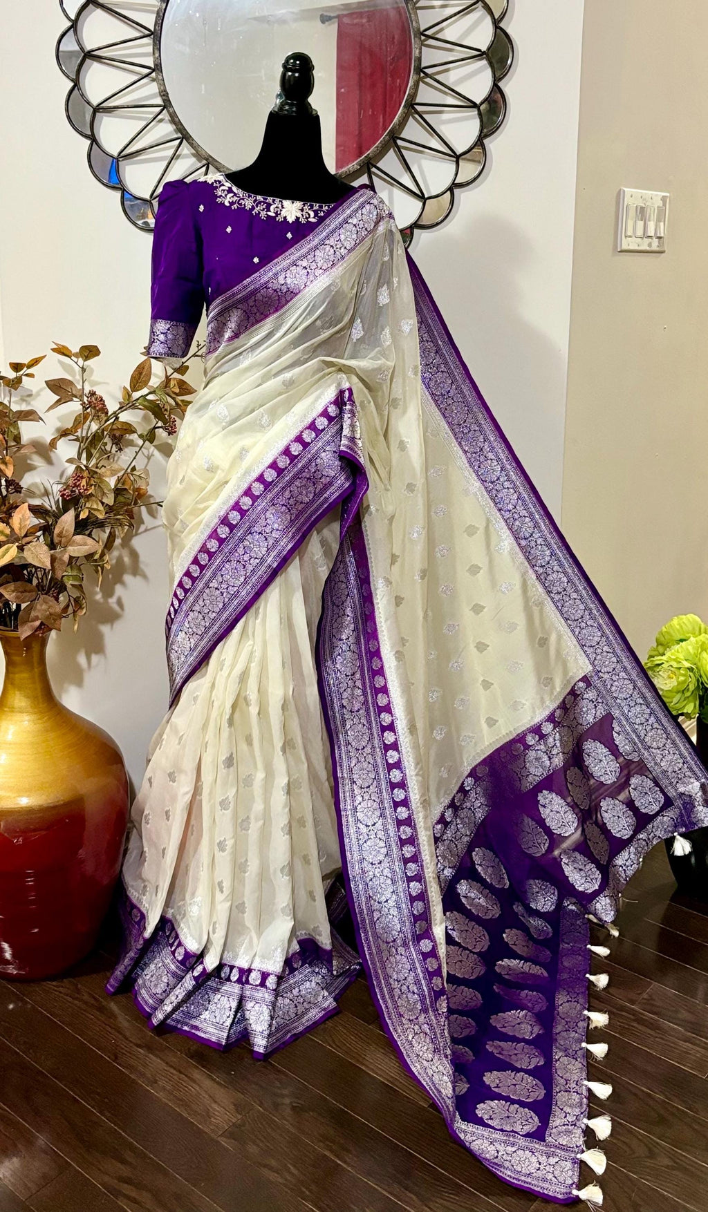 Beautiful banarasi saree paired up with pretty maggam work blouse.