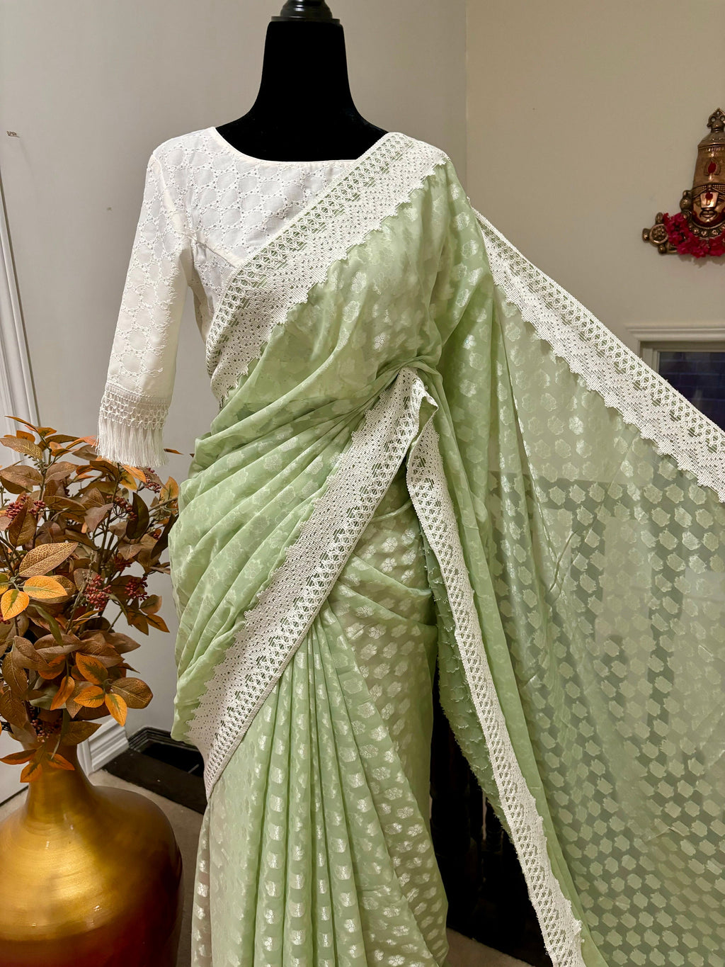 Beautiful soft falling  georgette on  sabyasachi  lace borders unique,  eye cooling pestal shades. Ready to wear designer blouse fits 32-44
