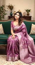 Beautiful banarasi saree with silver Zari weaving all over the saree paired up with pretty ready to wear  blouse that fits to 32 to 46