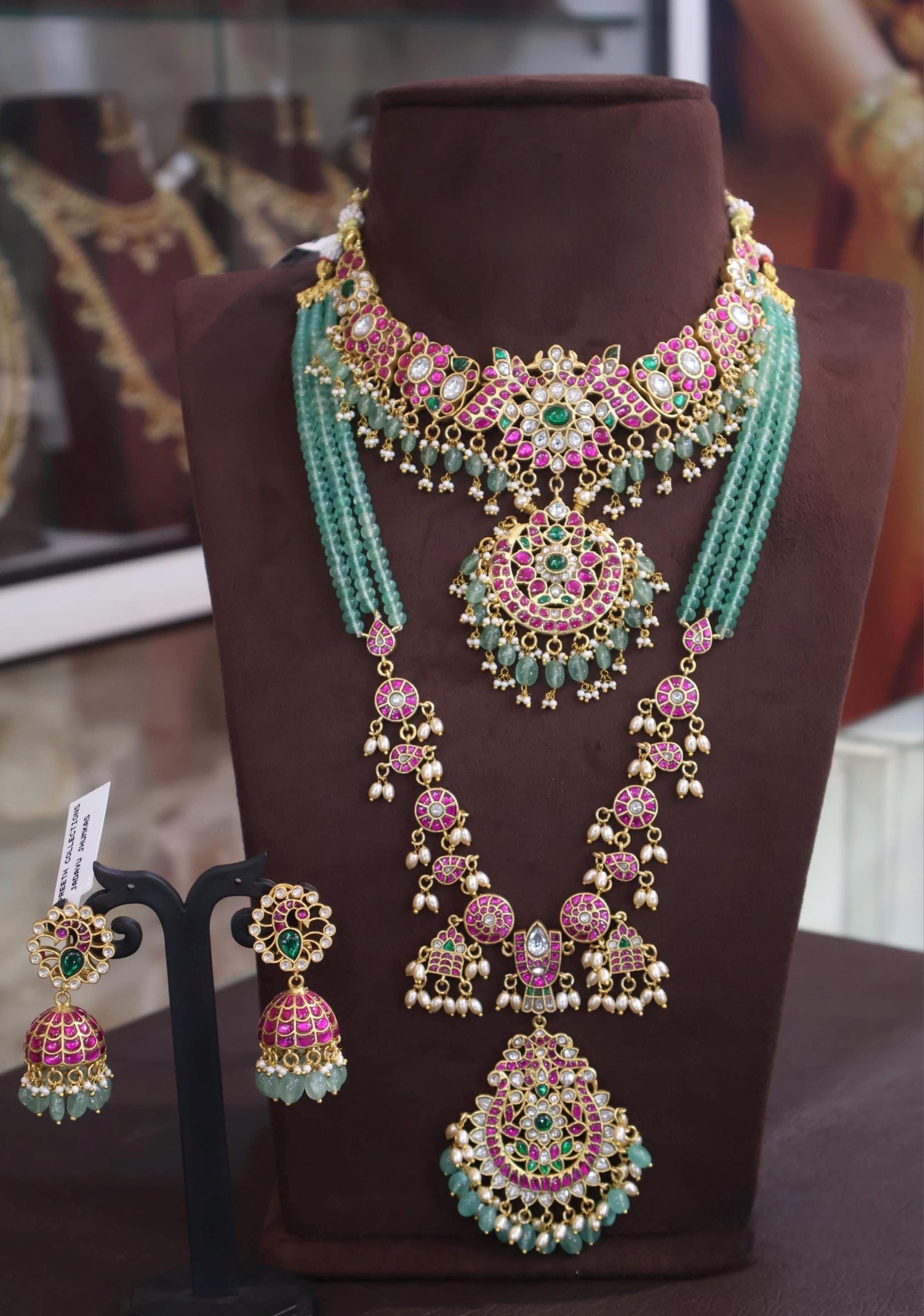 Party and wedding wear Anteque gold  finish one gram gold bridal set with precious pearls , emaralds beads and Kempu stones