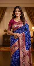 Beautiful patola paithani saree paired up with pretty banaras weaving blouse