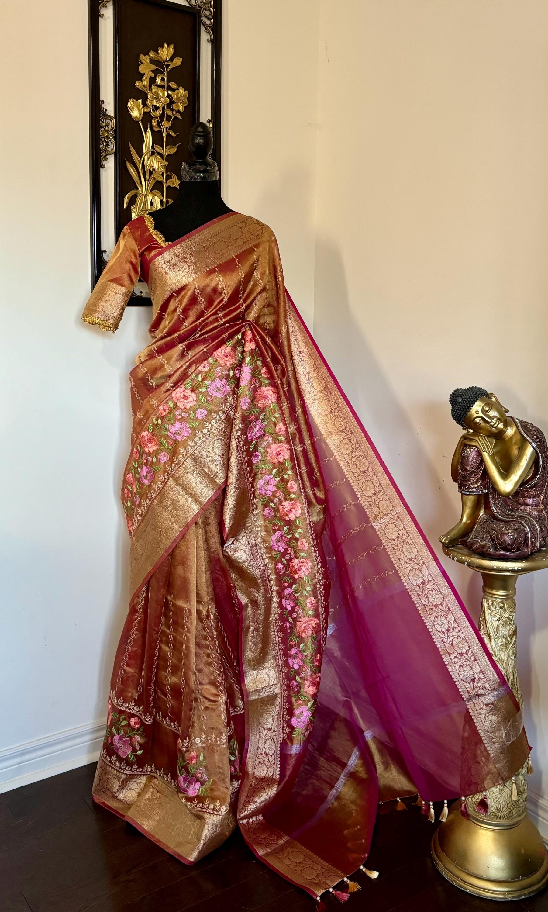Banarasi  tissue saree with self weaving with beautifully embroidered boarder all over the saree Rose Gold  shade rich weaving ready Blouse
