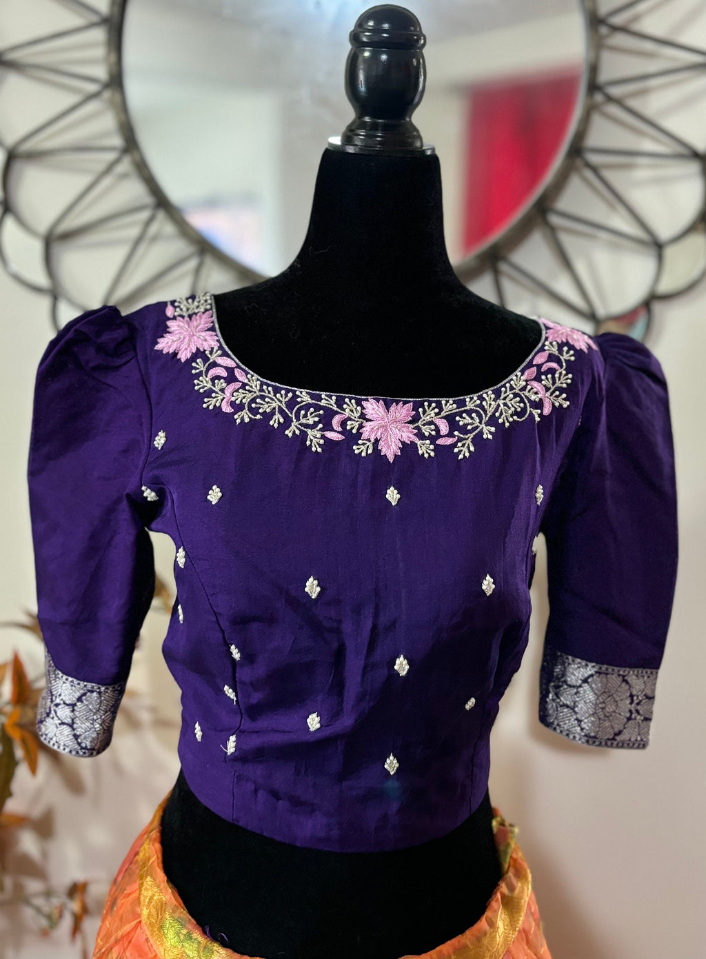 Beautiful banarasi saree paired up with pretty maggam work blouse.