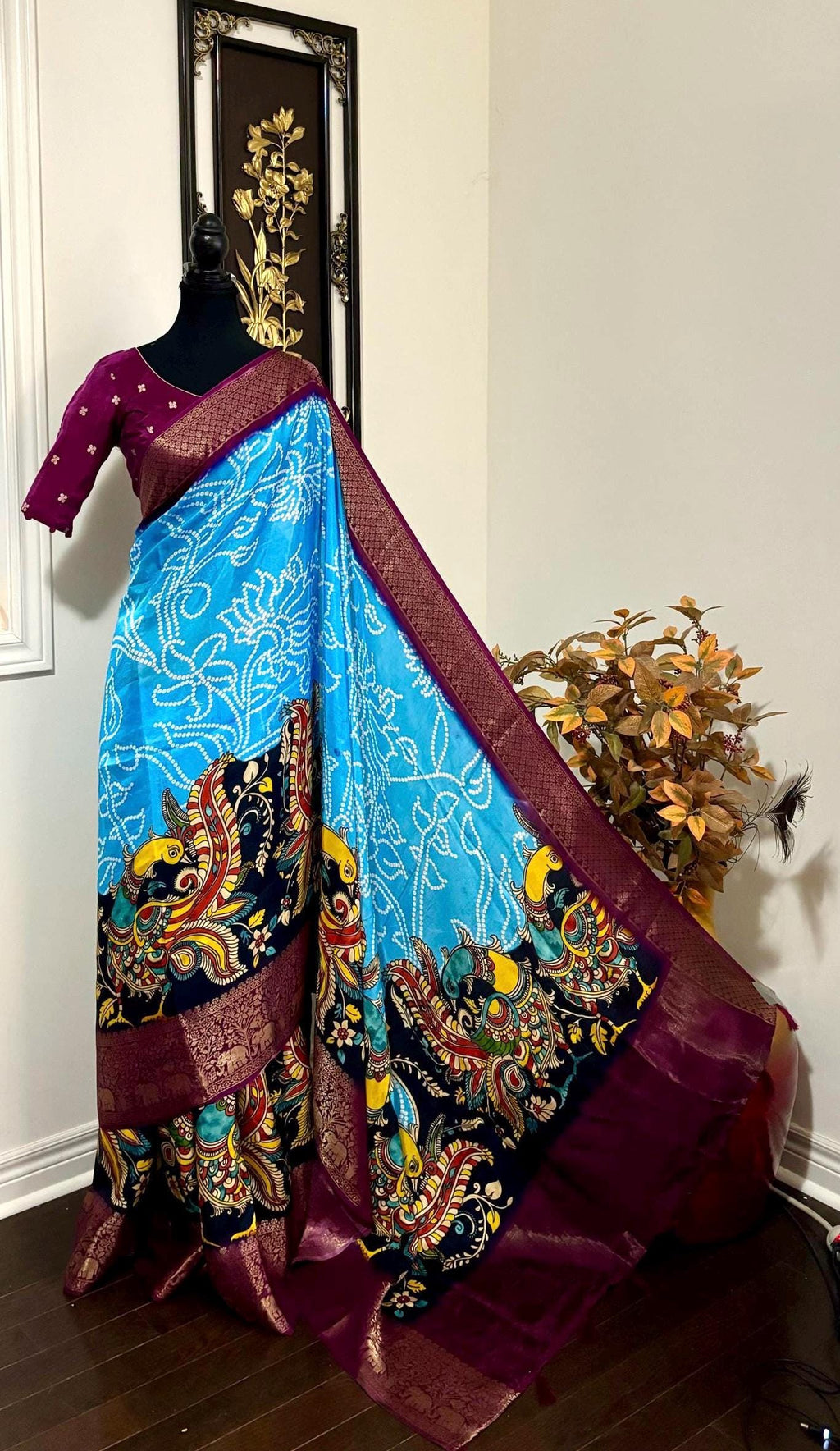 Beautiful pure silk bandini silk saree paired up pretty blouse sizes 32 -46 ready to wear.With Zari boarders elephant prints and peacocks