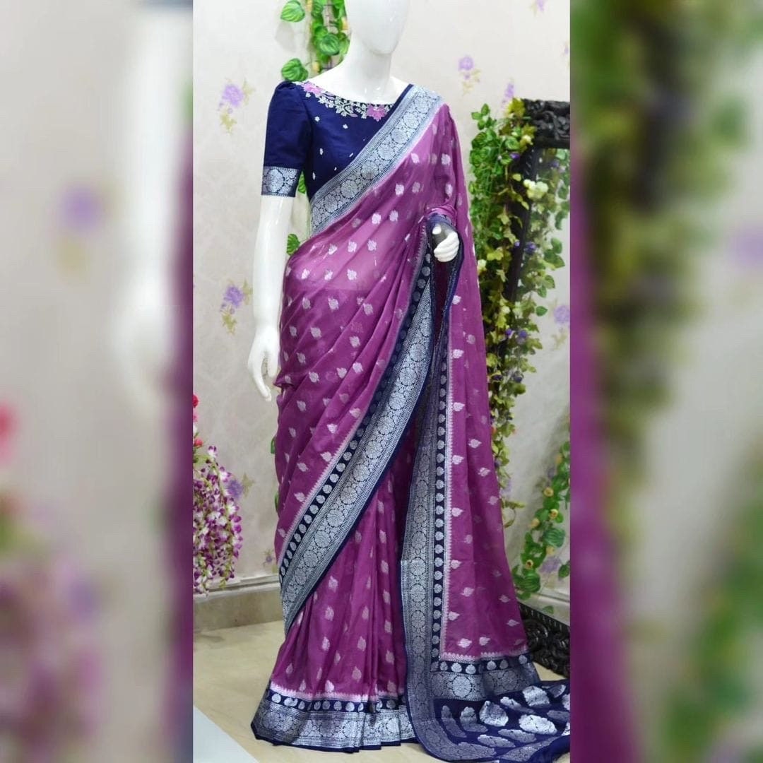 Beautiful banarasi kattan saree paired up with pretty maggam work blouse.