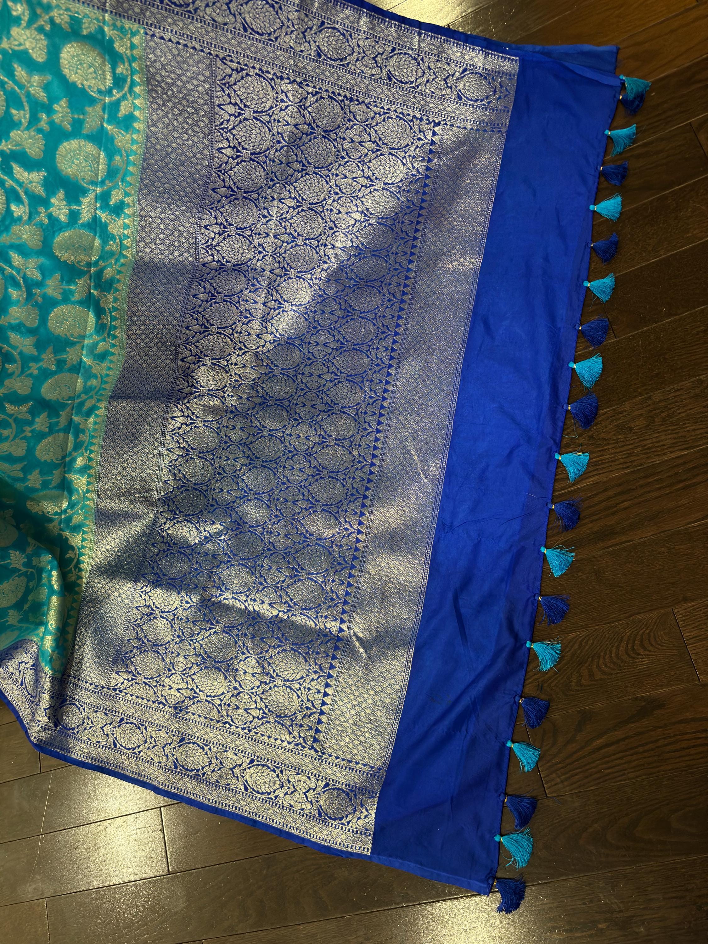 Beautiful banarasi silk saree paired up with beautiful embroidery blouse fits to 32 to 46 in beautiful rare colors all over jaal. Cocktails