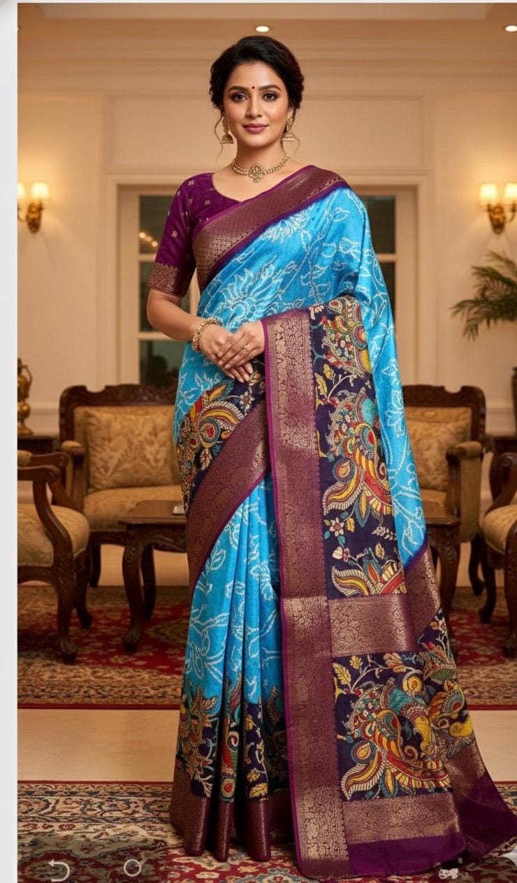Beautiful pure silk bandini silk saree paired up pretty blouse sizes 32 -46 ready to wear.With Zari boarders elephant prints and peacocks