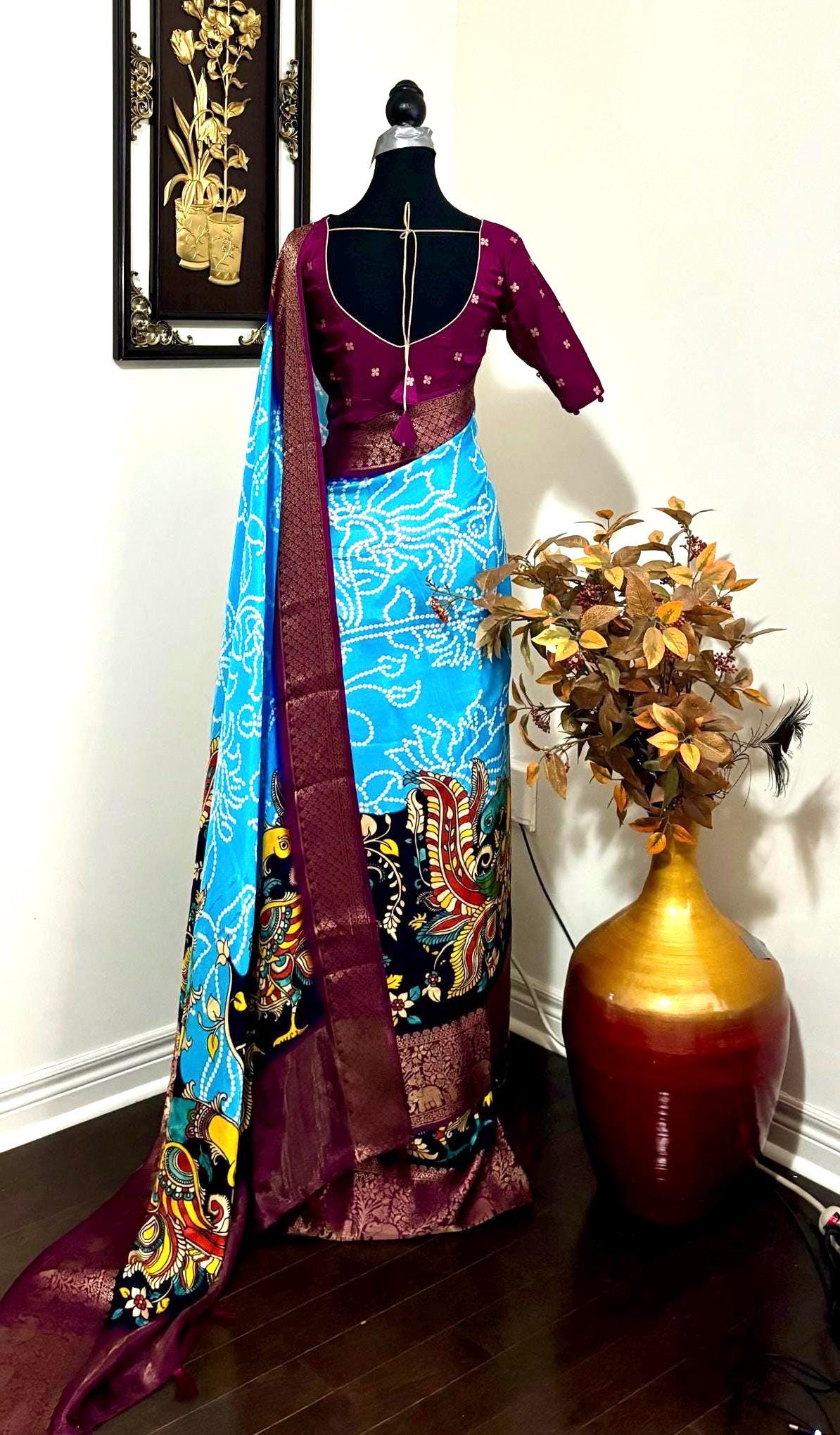 Beautiful pure silk bandini silk saree paired up pretty blouse sizes 32 -46 ready to wear.With Zari boarders elephant prints and peacocks