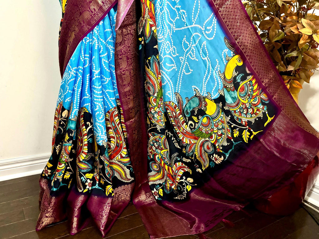 Beautiful pure silk bandini silk saree paired up pretty blouse sizes 32 -46 ready to wear.With Zari boarders elephant prints and peacocks