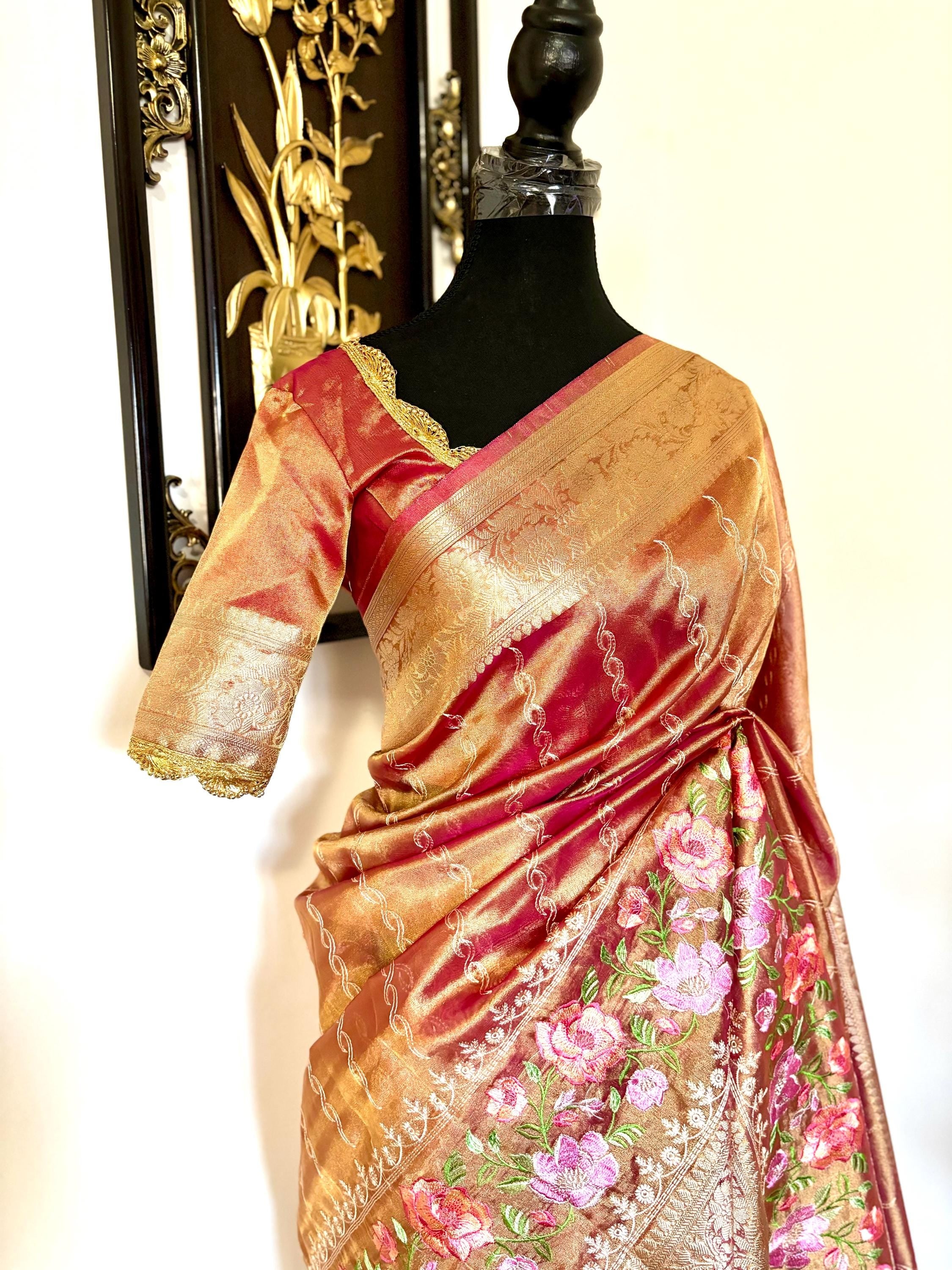 Banarasi  tissue saree with self weaving with beautifully embroidered boarder all over the saree Rose Gold  shade rich weaving ready Blouse