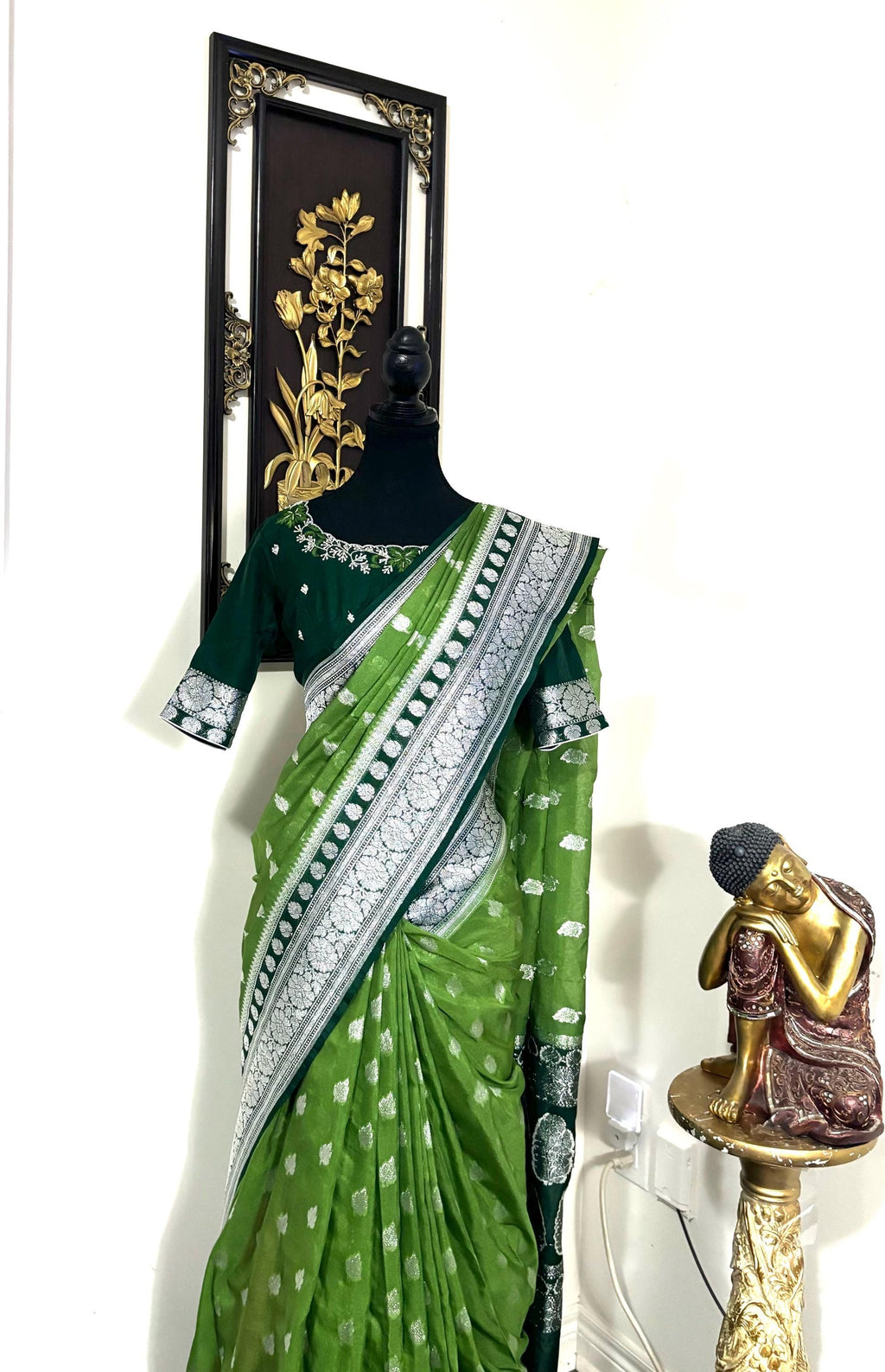 Beautiful banarasi saree paired up with pretty maggam work blouse.dits to 32-46