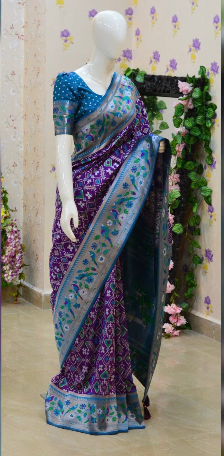 Beautiful patola paithani saree paired up with pretty banaras weaving blouse
