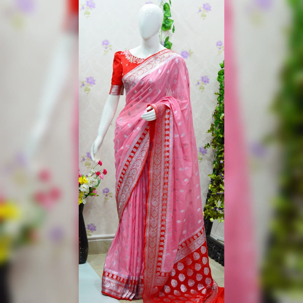 Beautiful banarasi saree paired up with pretty maggam work blouse.