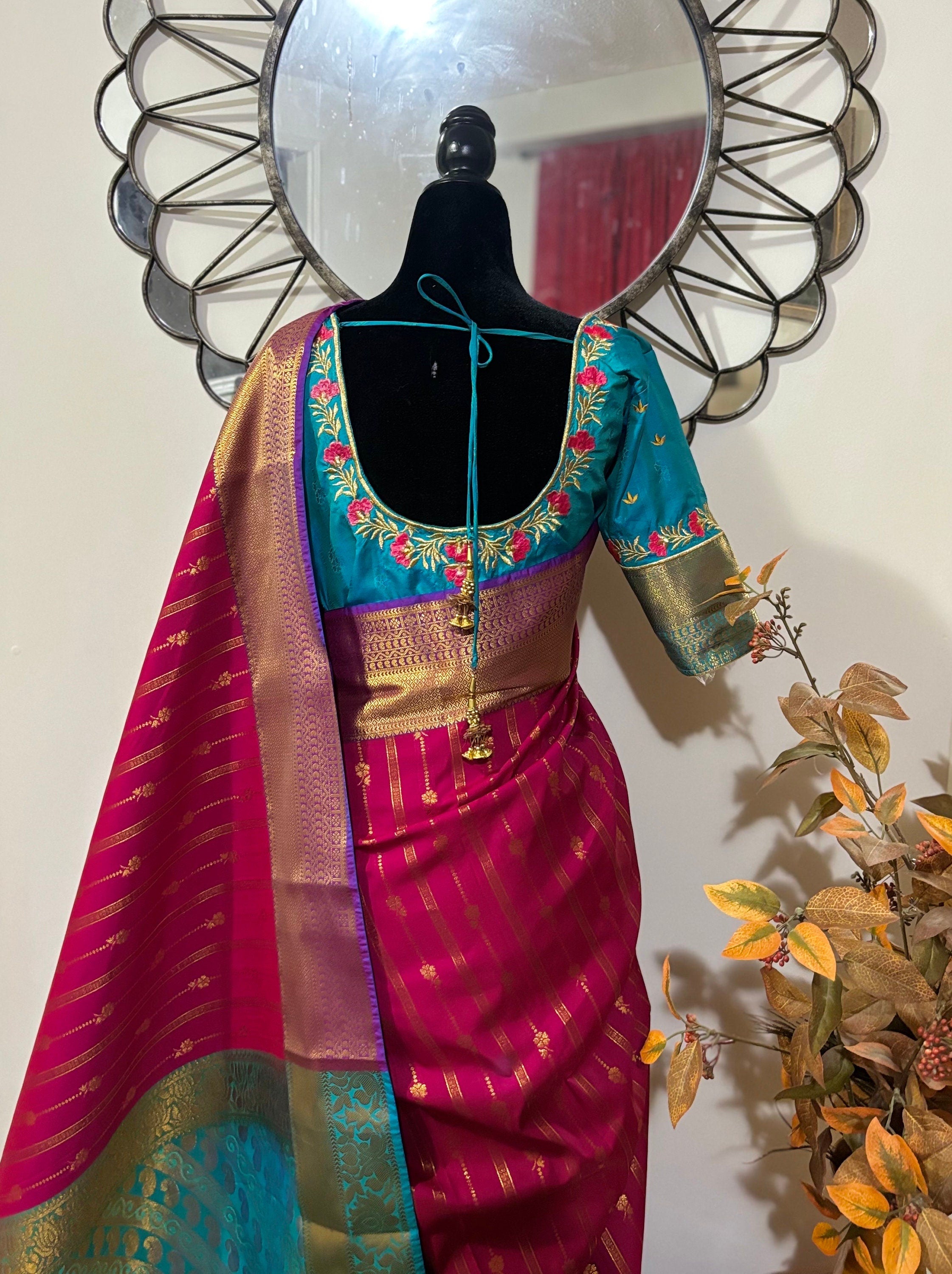 Kanchipuram soft silk saree in rarecolors with beautifully done hand  made embroidered blouse with readytowear work blouse fitsup to32 to 46