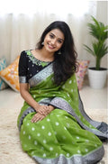 Beautiful banarasi saree paired up with pretty maggam work blouse.