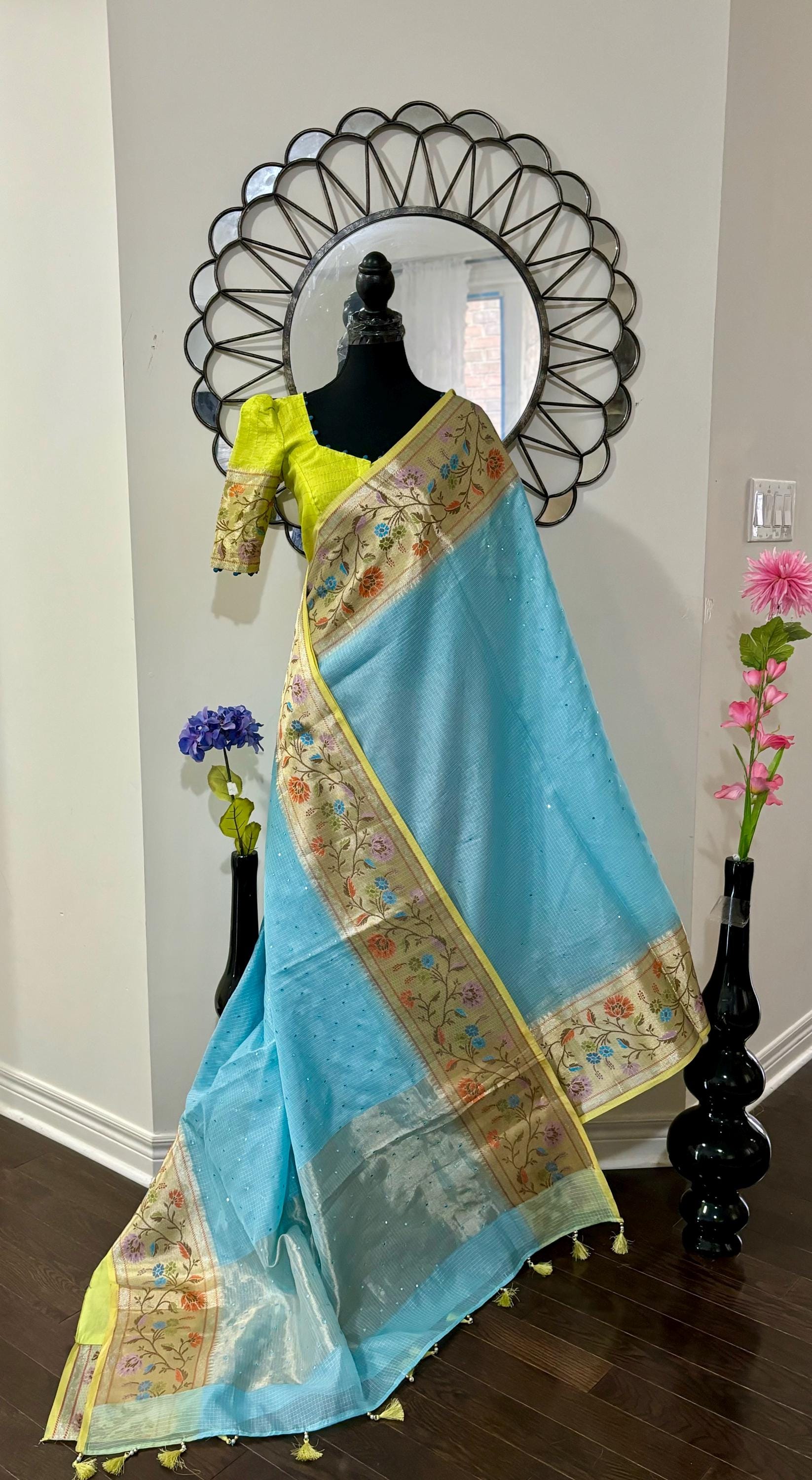 Beautiful Tissue Zari Kota saree with pythani Zari boardes and beautifully done work blouse paired up with pretty blouse fits up to 32 to 46