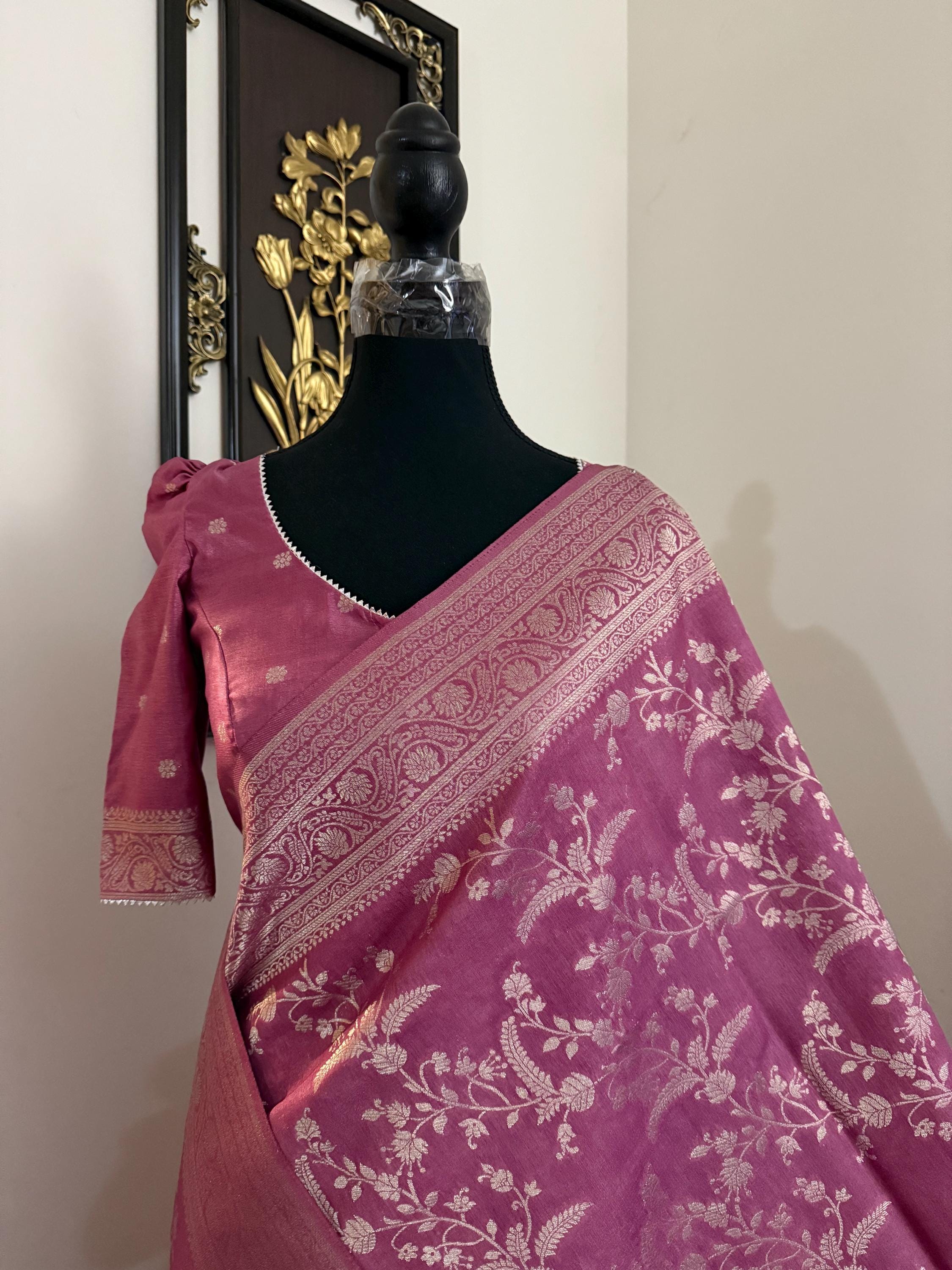 Beautiful banarasi saree with silver Zari weaving all over the saree paired up with pretty ready to wear  blouse that fits to 32 to 46