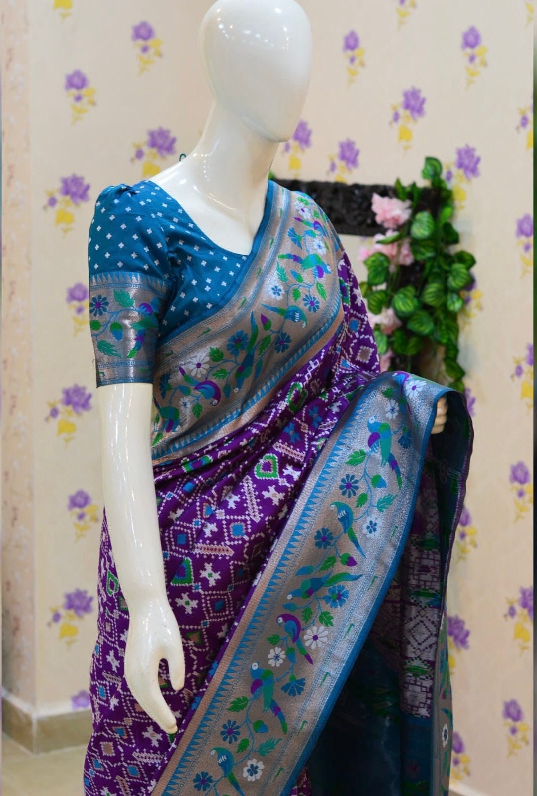 Beautiful patola paithani saree paired up with pretty banaras weaving blouse