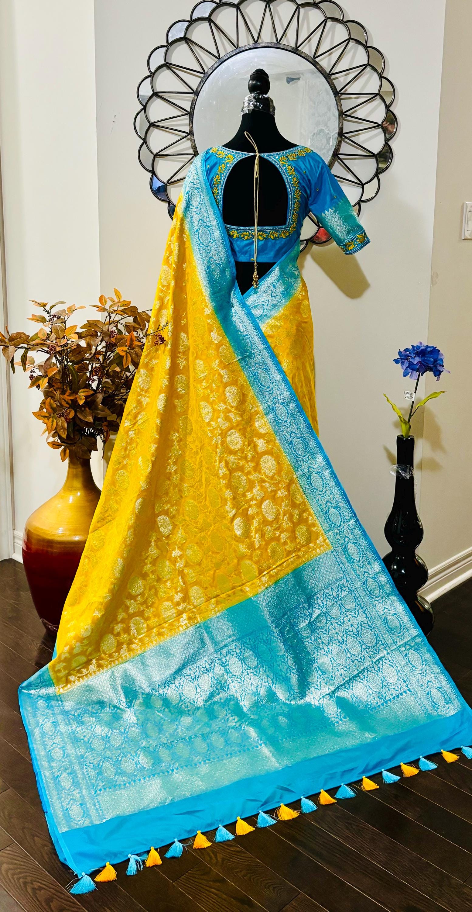 Beautiful banarasi silk saree paired up with beautiful embroidery blouse fits to 32 to 46 in beautiful rare colors all over jaal. Cocktails