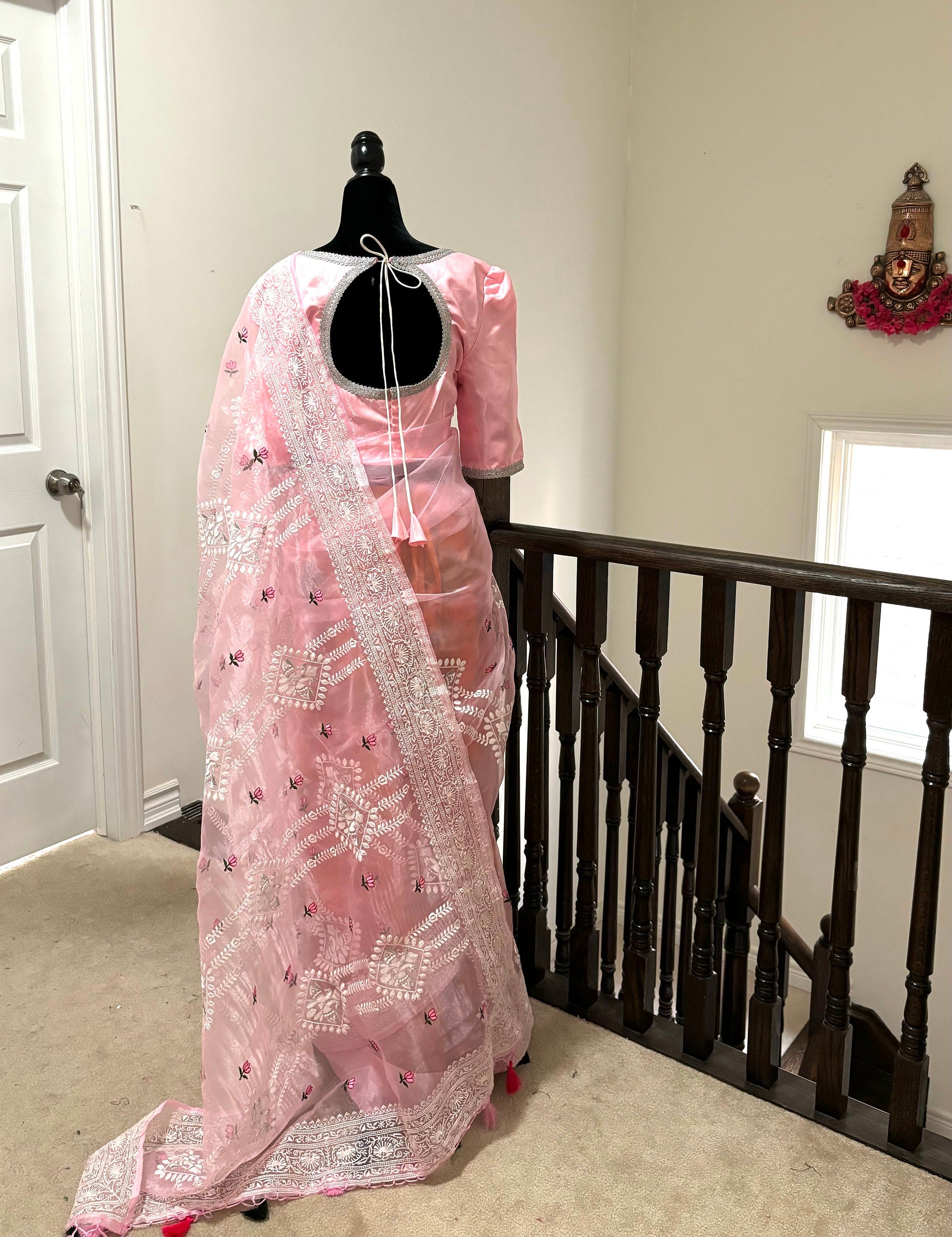 Banarasi  organza saree with beautiful chiken Kari all over the saree. Saree is ready with beautiful designer blouse that fit to 32-46 Ideal