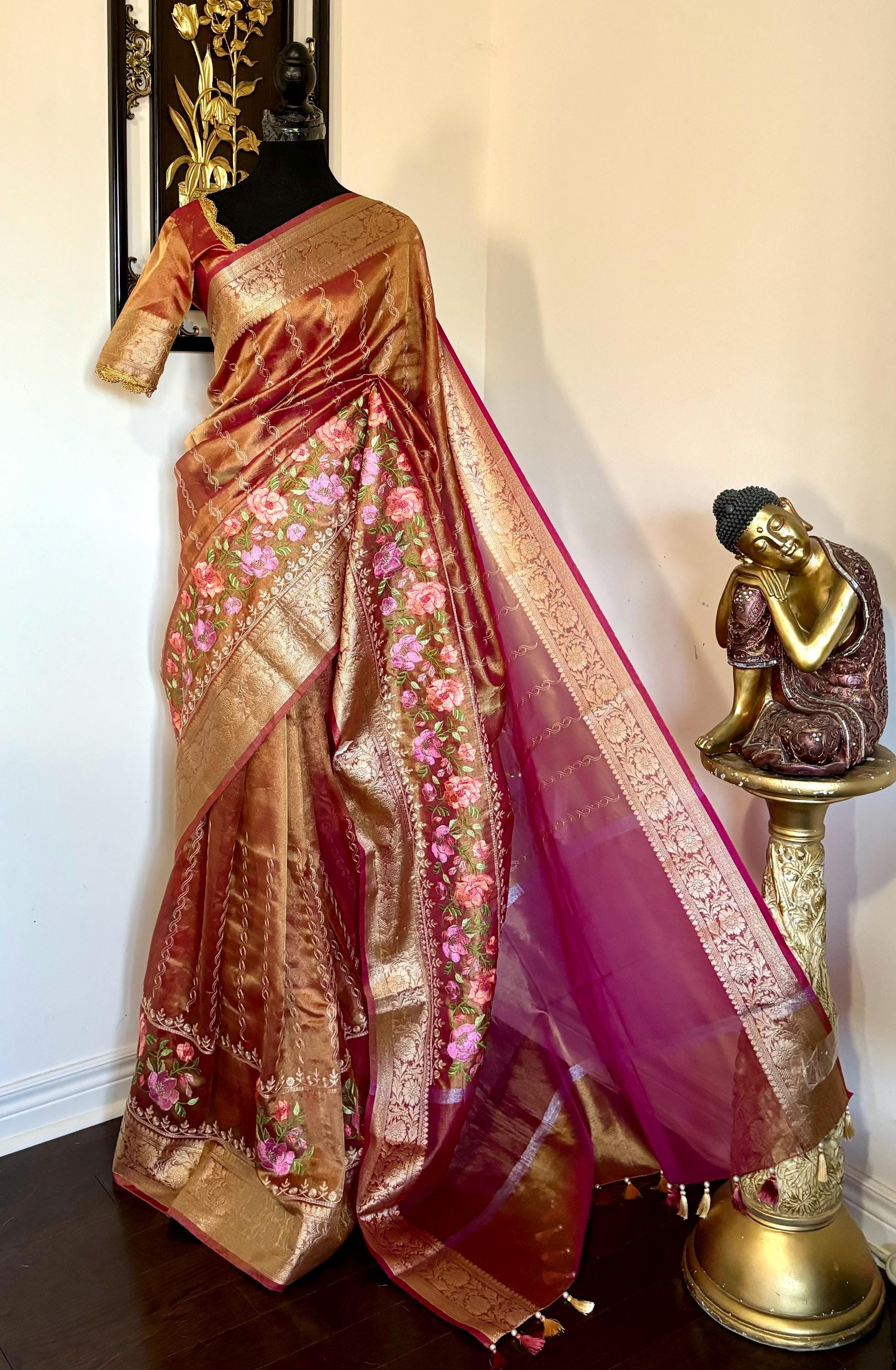 Banarasi  tissue saree with self weaving with beautifully embroidered boarder all over the saree Rose Gold  shade rich weaving ready Blouse