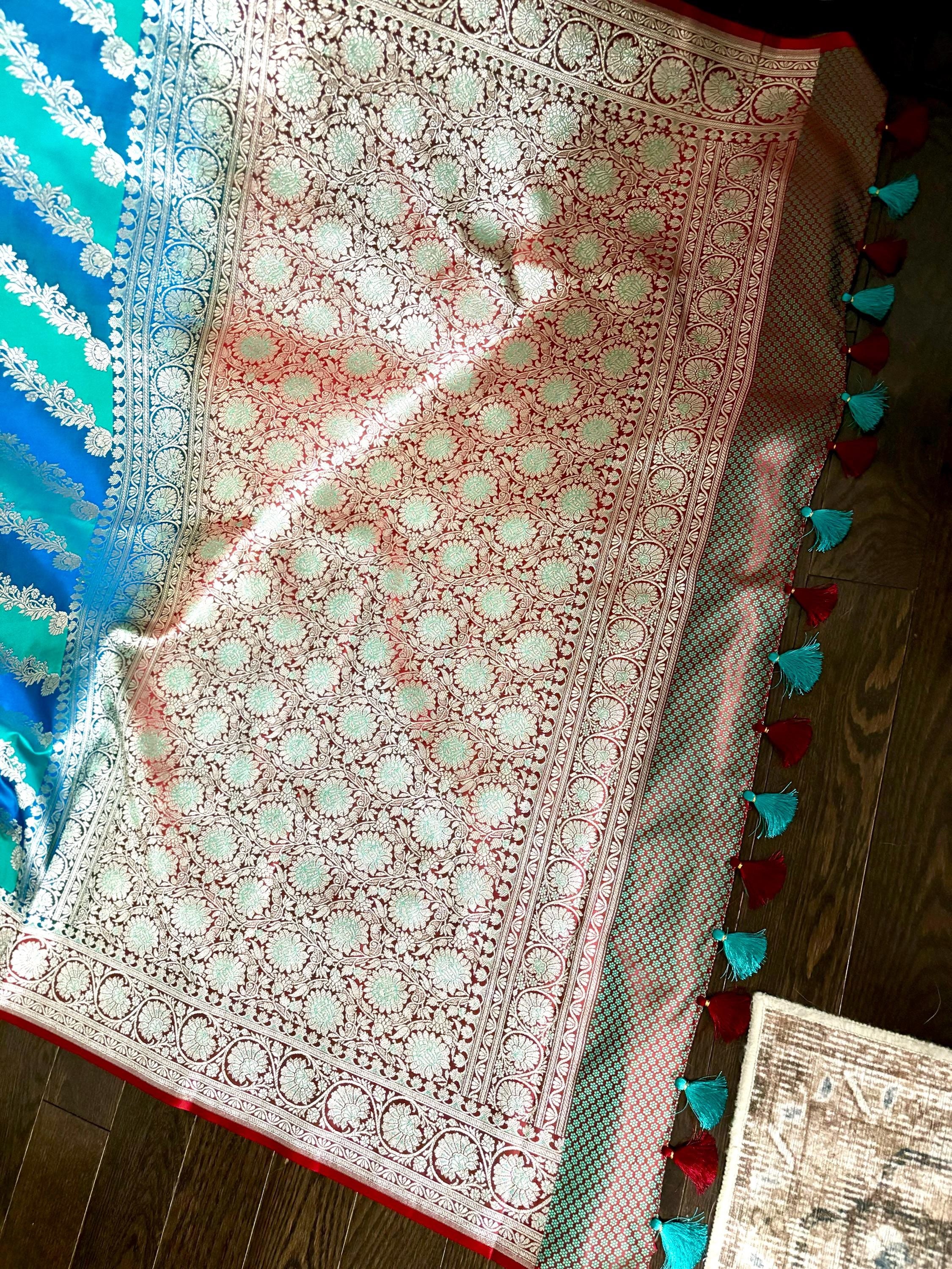 Pure silk  banarasi silk saree paired up with beautiful embroidery blouse fits to 32 to 46 in beautiful rare colors all over jaal. Cocktails