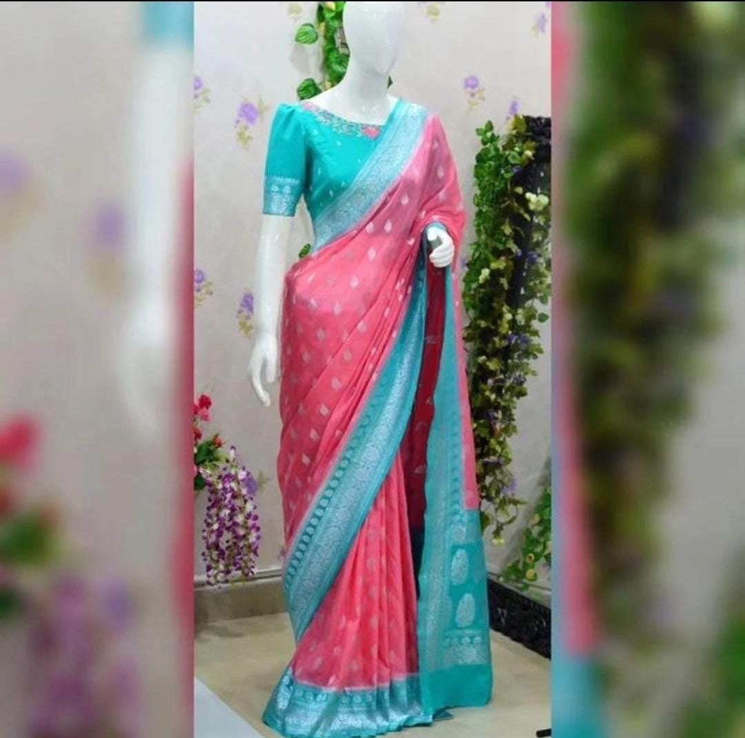 Beautiful banarasi saree paired up with pretty maggam work blouse.