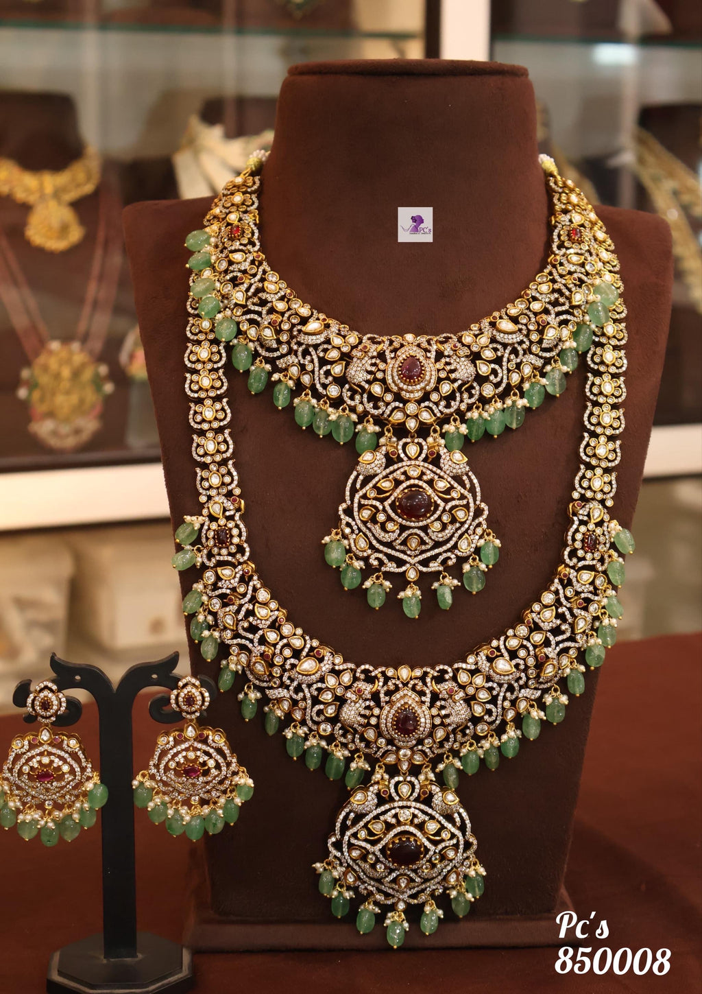 Stone studded Matt  finish  gold finish beautifully done wedding set ! Neck lace and long haram, and ear rings set