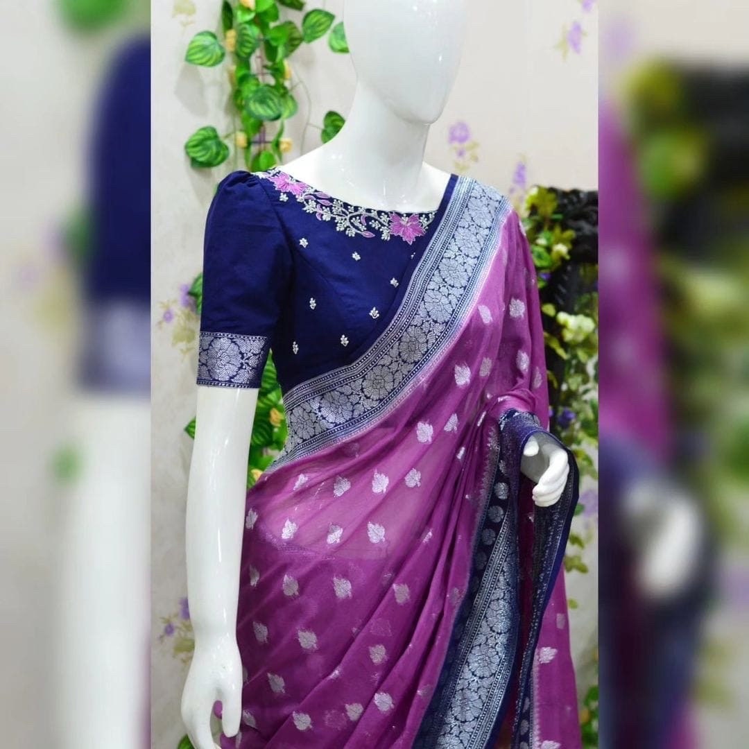 Beautiful banarasi kattan saree paired up with pretty maggam work blouse.
