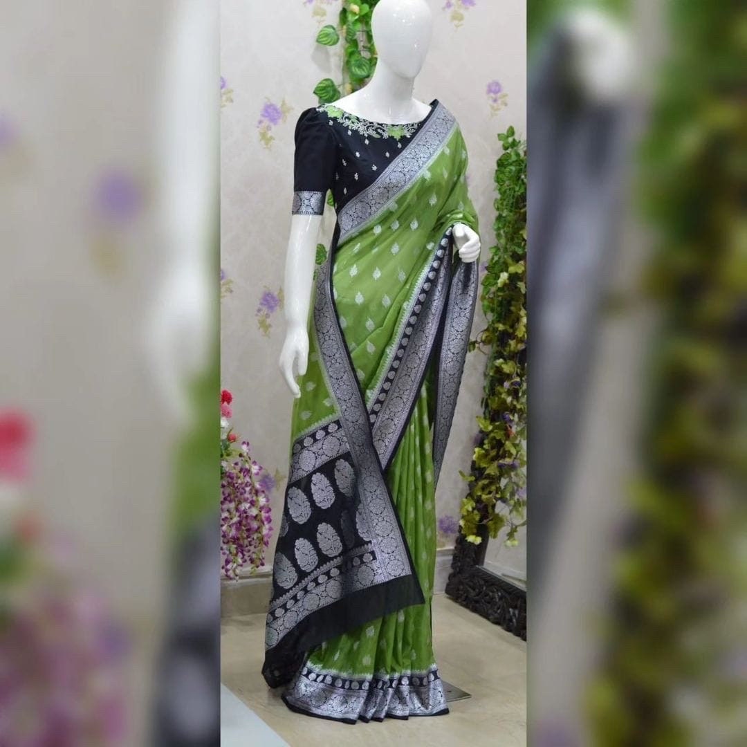 Beautiful banarasi saree paired up with pretty maggam work blouse.