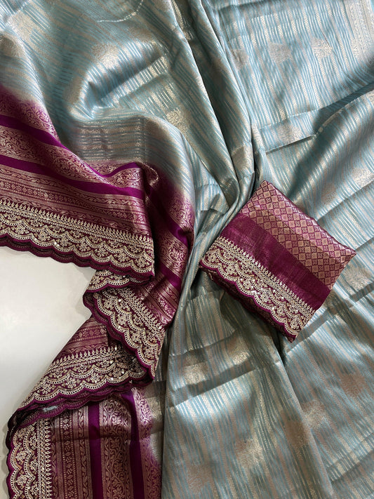 Banarasi organza tissue saree with self weaving butties on all over the sareedual shade contrast rich contrast weaving