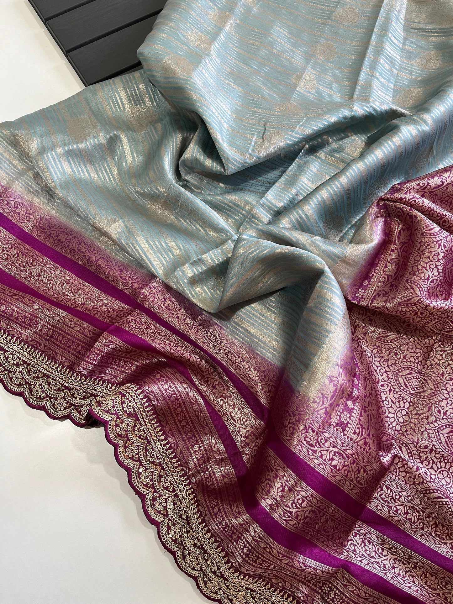 Banarasi organza tissue saree with self weaving butties on all over the sareedual shade contrast rich contrast weaving